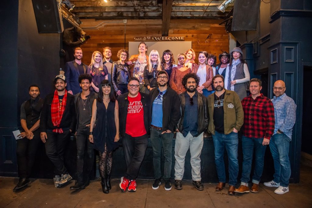 A diverse group of musicians and advocates gathered together