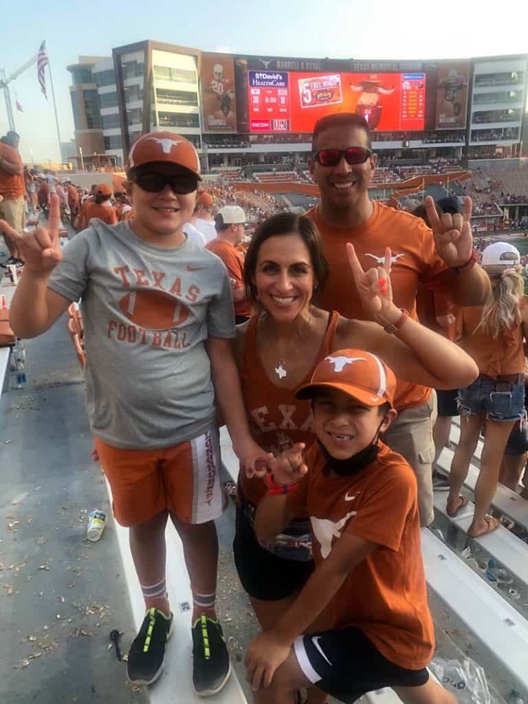 Christine with family gathered at UT football game