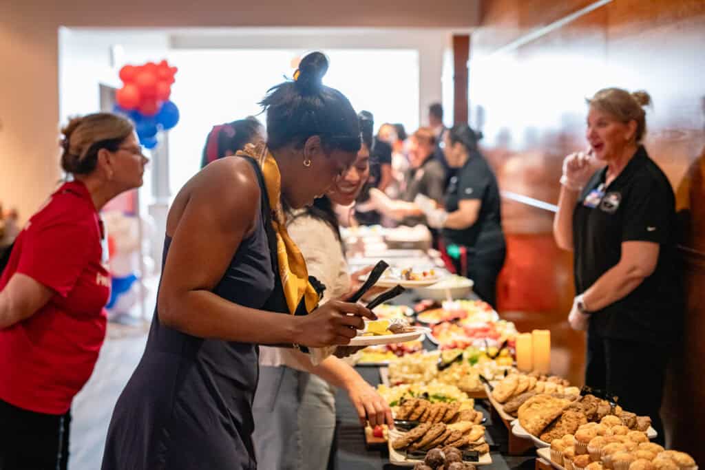 Long Center members enjoy their complimentary brunch prior to the start of Teresa Lozano Long Community Day at the Long Center.